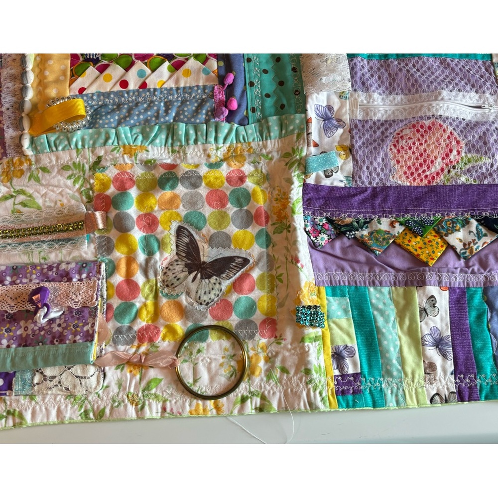 Fidget quilt in teal/purple/etc